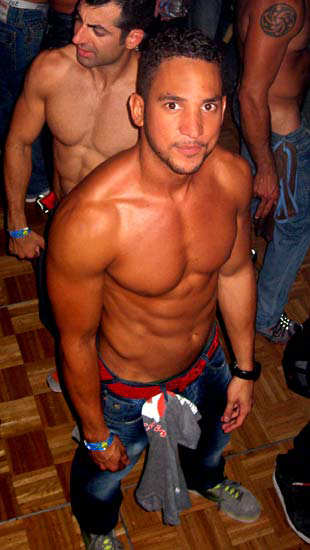 Hot guy at closing party looking up at me dancing badly on the podium.jpg
